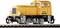 A yellow model of a diesel locomotive on a track, with the inscription '102 005-6'.