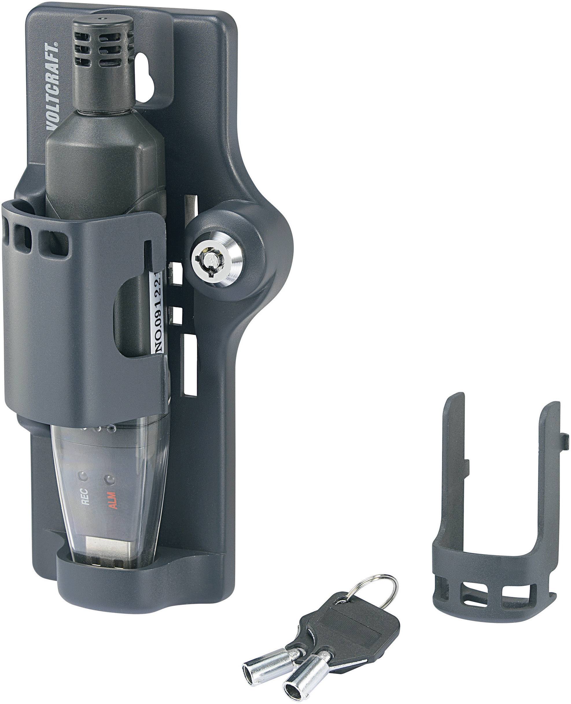 A black holder for an electrical device, next to two keys and a removable mount. Brand logo in the top left corner.