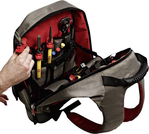 Opened tool backpack with various tools, including pliers and screwdrivers, shows organised compartments for handyman purposes.
