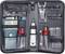 An electronic tool kit with cable tester, screwdrivers, wire cutters and additional accessories, neatly stored in a bag.