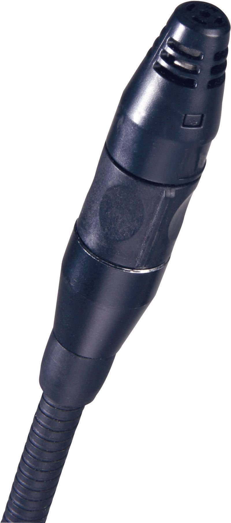 A black microphone, photographed from an angled overhead view, with a ribbed handle and ventilation slots at the top end.