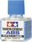 Bottle of Tamiya Cement for ABS, 40 ml; clear plastic container with blue screw cap and label featuring logo and product information.