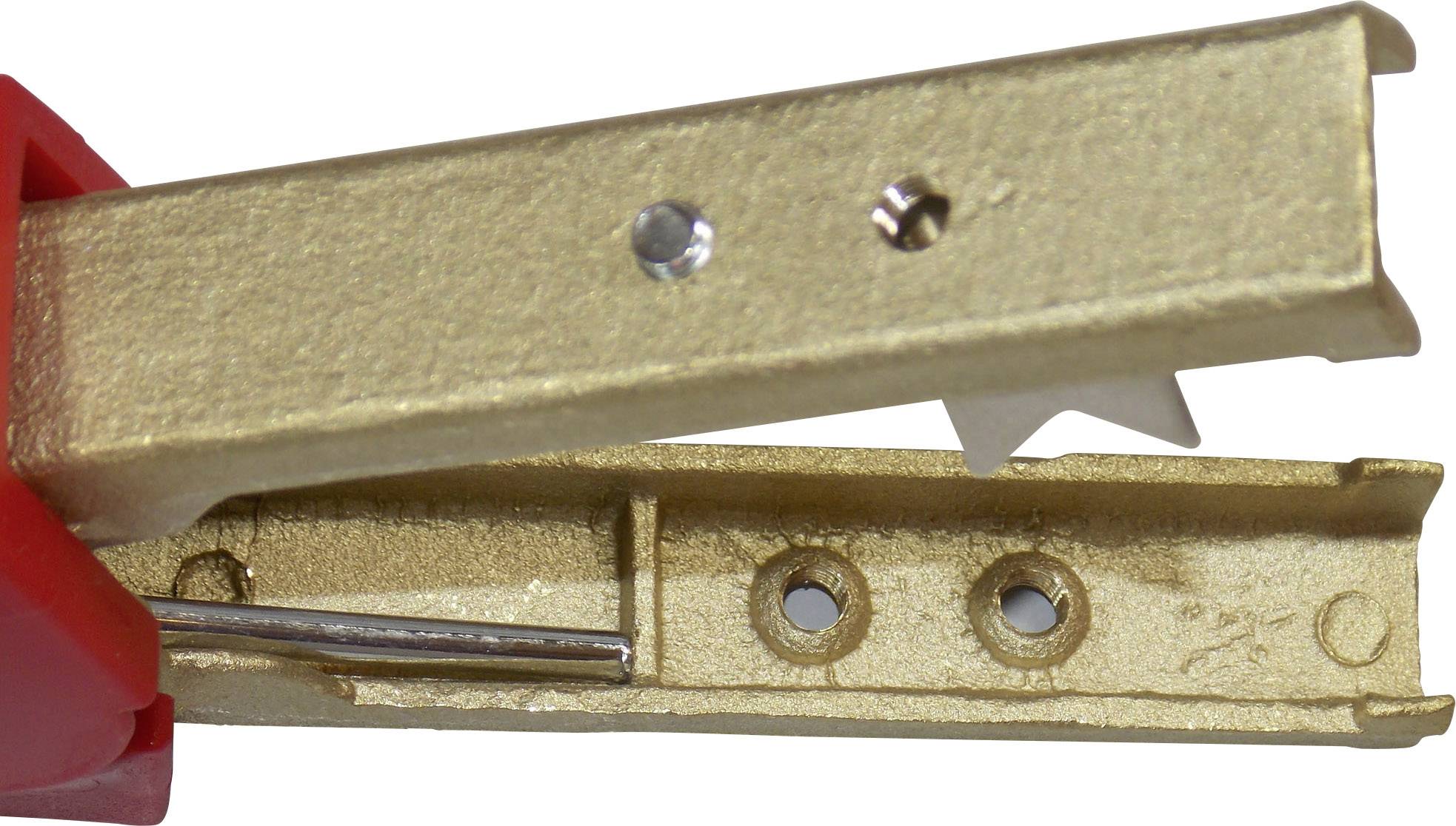Close-up of a gold-coloured punch tool with a red handle, showing metallic structure and visible hole for punching process.