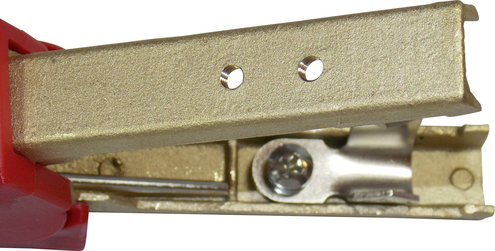 An open stapler with a visible metal mechanism and a red plastic handle. The stapler has two holes on the side.
