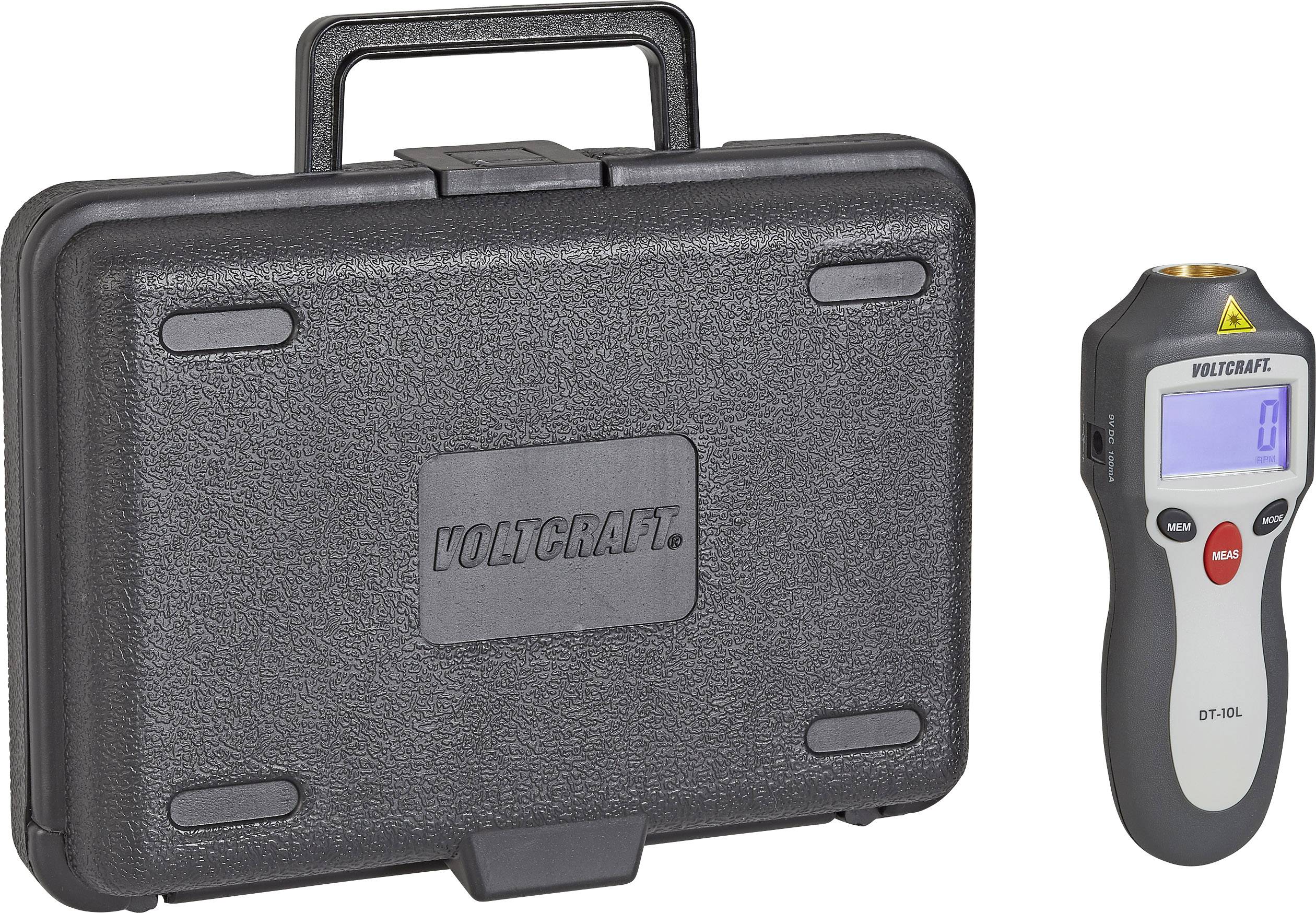 An infrared thermometer beside a black plastic case. The display shows '0'. The thermometer has a handle.