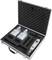 An open aluminium case contains two bottles of liquids and an electronic measuring device, all securely nestled in foam inserts.
