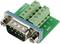A green DB9 plug adapter with screw terminals, for connecting serial cables to a circuit board.