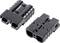 Two black electric connectors, lying side by side, each with two connection openings and a structured design.