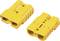 Two yellow electrical plugs with plus and minus symbols to indicate polarity. They are positioned side by side on a light background.