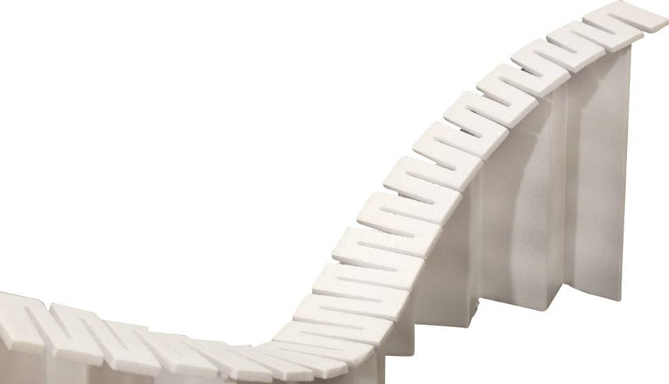 White domino tiles form a curved line. Some tiles have already fallen, while others are still standing.