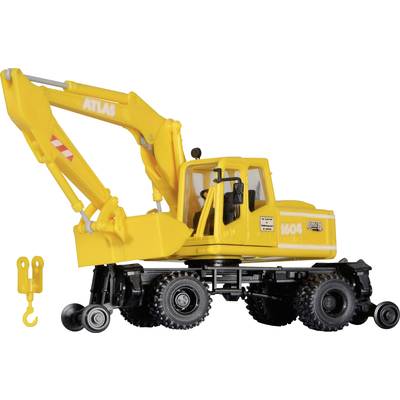 A yellow toy digger with four large wheels and a movable grab arm. The digger is mounted on a black trolley.