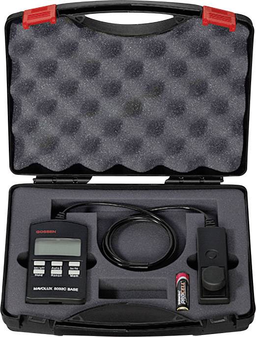 Open black suitcase with measuring device, cables and battery, arranged on foam padding.