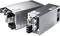 Two silver power supplies side by side with ventilation grilles and black connectors, showing technical details and product labels.