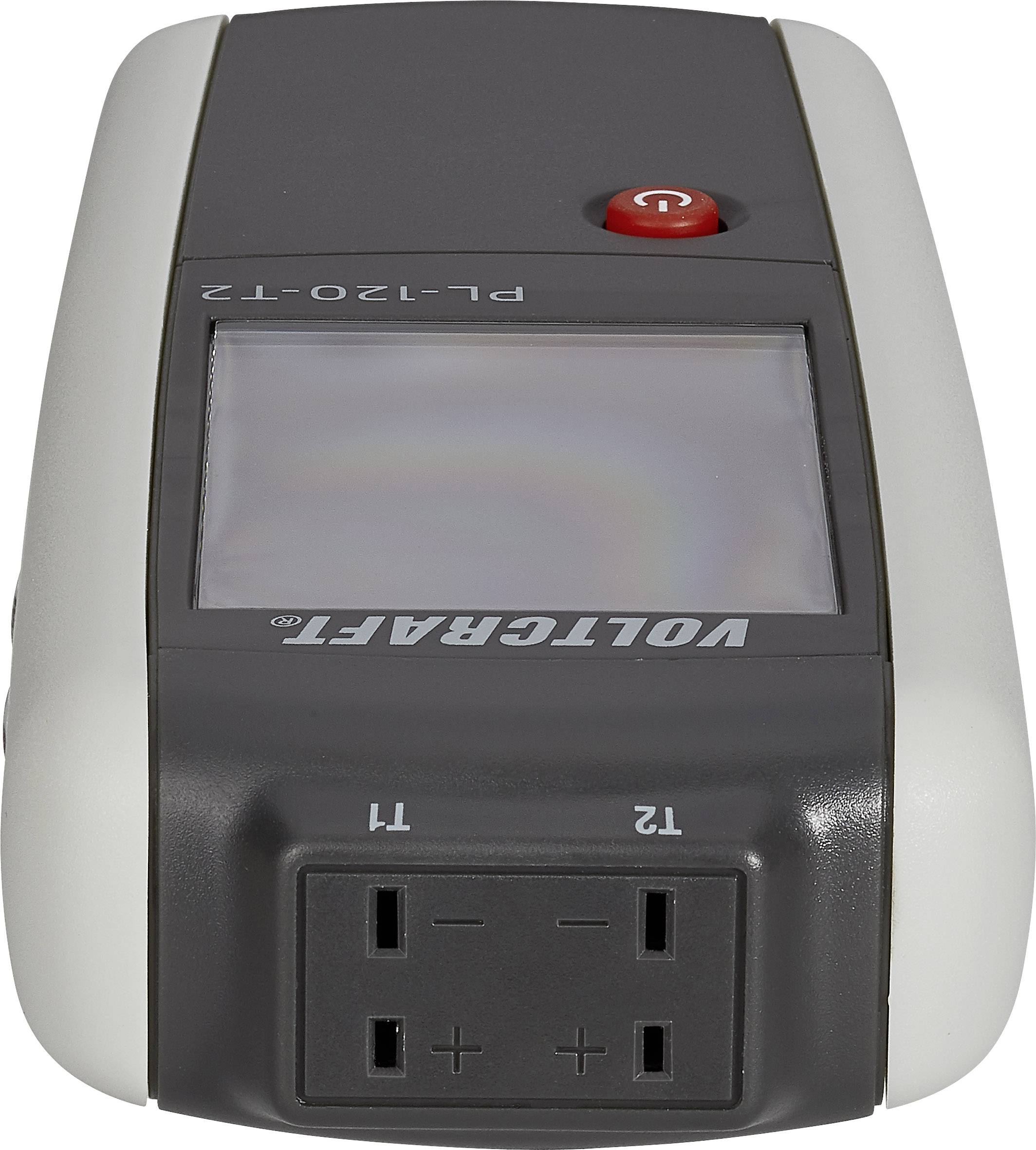 A voltage tester with a display and two sockets on the side. At the top, there is a red button for operation.