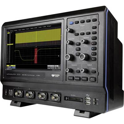 An oscilloscope displays a yellow and red signal diagram on the screen. Control buttons and connectors are visible.