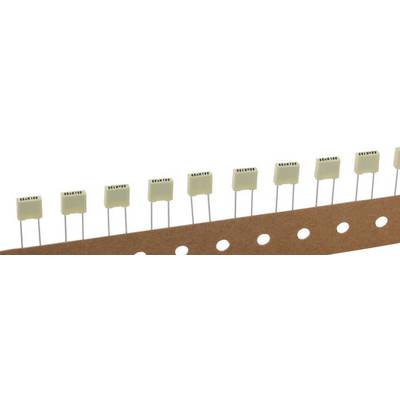 Several beige electrolytic capacitors on a tape strip, used for automatic mounting in electronic devices.
