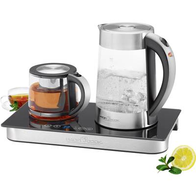 Two glass kettles on an induction hob. Tea on the left, boiling water on the right. Decoration: mint leaves and lemon slices.