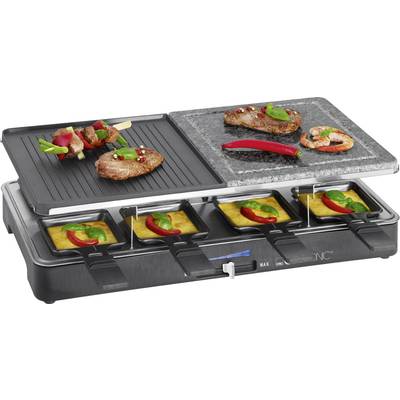 Raclette grill with meat, vegetables and prawns on the griddle plate. Underneath, melted cheese in small pans.
