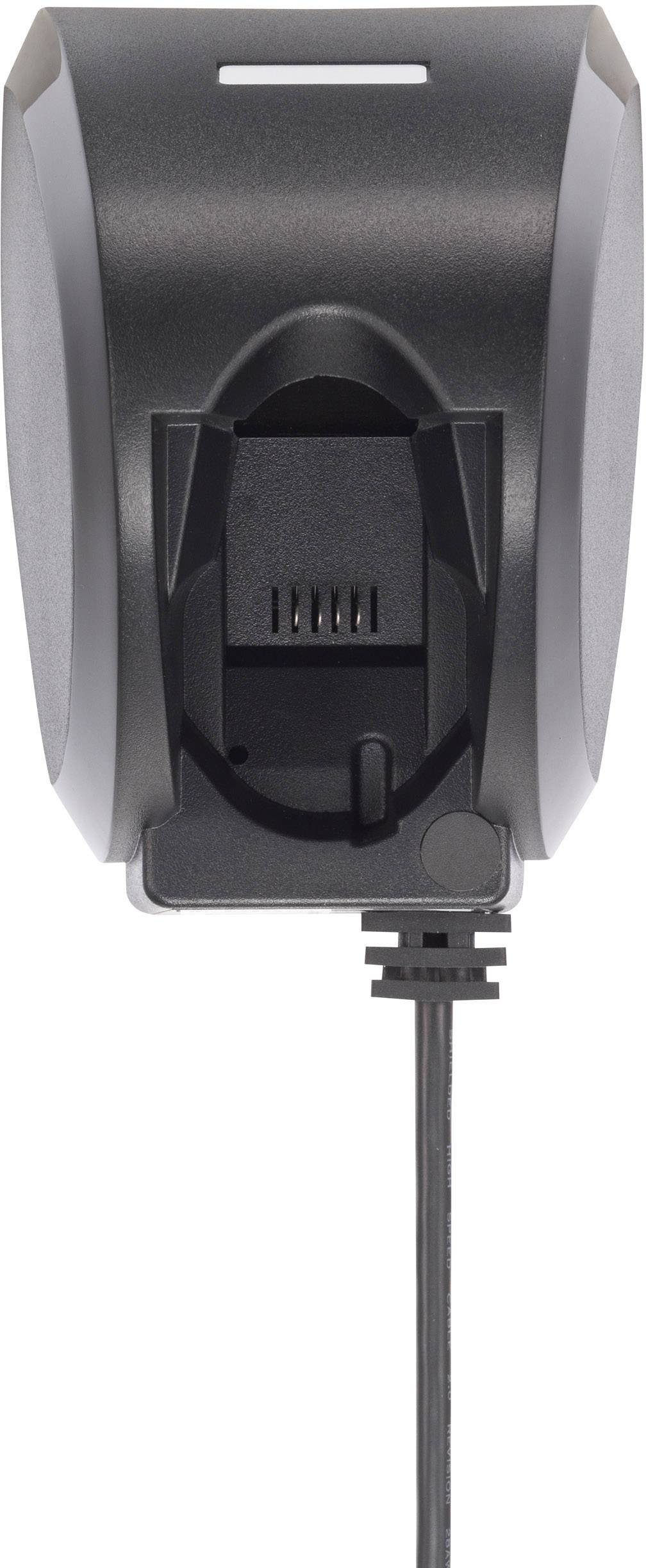 A black charger with cable, standing on its back with visible ports.