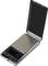 Digital pocket scales in silver with open lid, showing an illuminated display and function buttons for tare, units, and quantity.