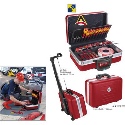 'Red toolbox with various screwdrivers and pliers. A mechanic is working with the toolbox in a workshop.'