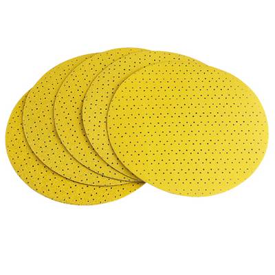 Four yellow, round sanding paper discs with small holes, stacked on top of each other.