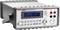 Digital multimeter with a blue display showing '000069 mV DC'. Various buttons and sockets on the front.