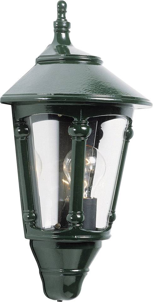 Exterior wall light in a classic lantern style, crafted from dark green metal with transparent glass panels, illuminated by incandescent bulbs.