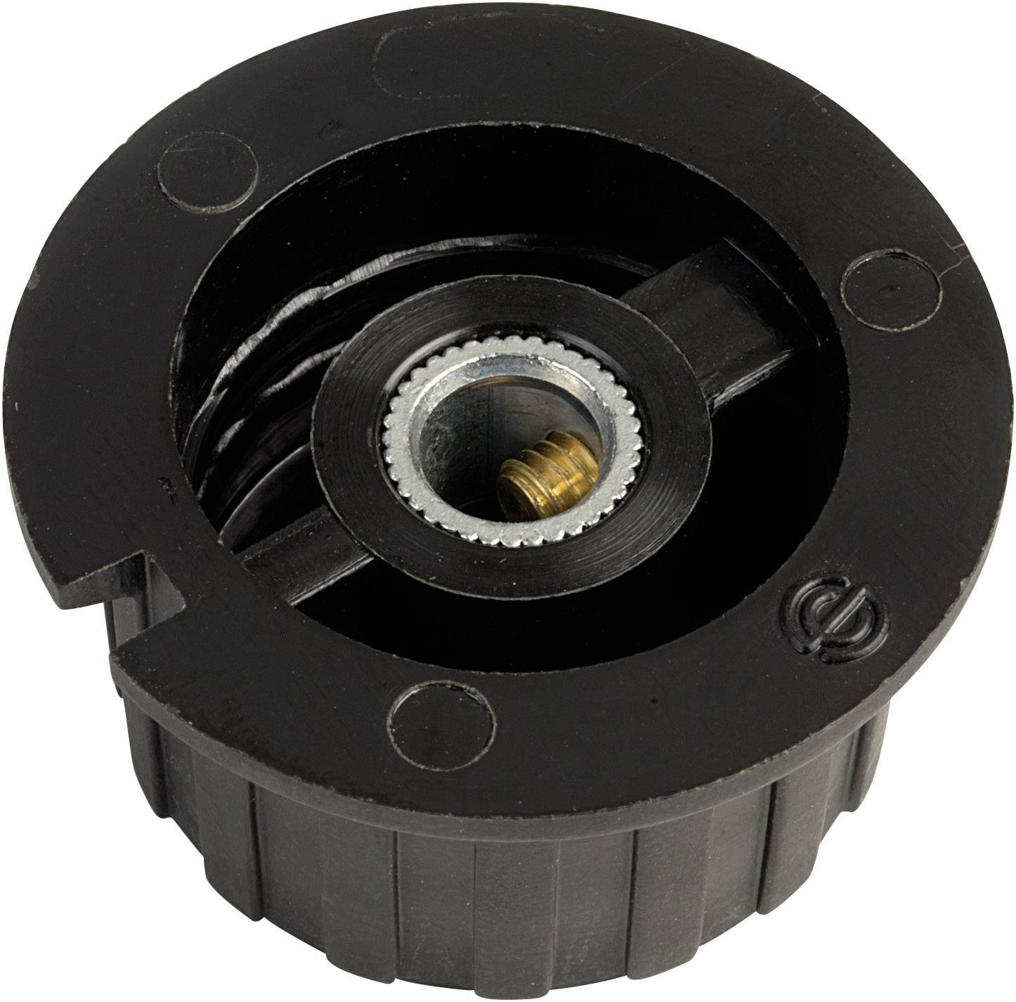 Black plastic component with a gear in the centre and a metal component, potentially part of a mechanical device or motor.