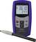 Measuring device for conductivity measurement. Display shows '361.0' and '24.4'. Black probe connected to device.