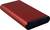 Red rectangular casing of an external hard drive or SSD drive, robust and compact.
