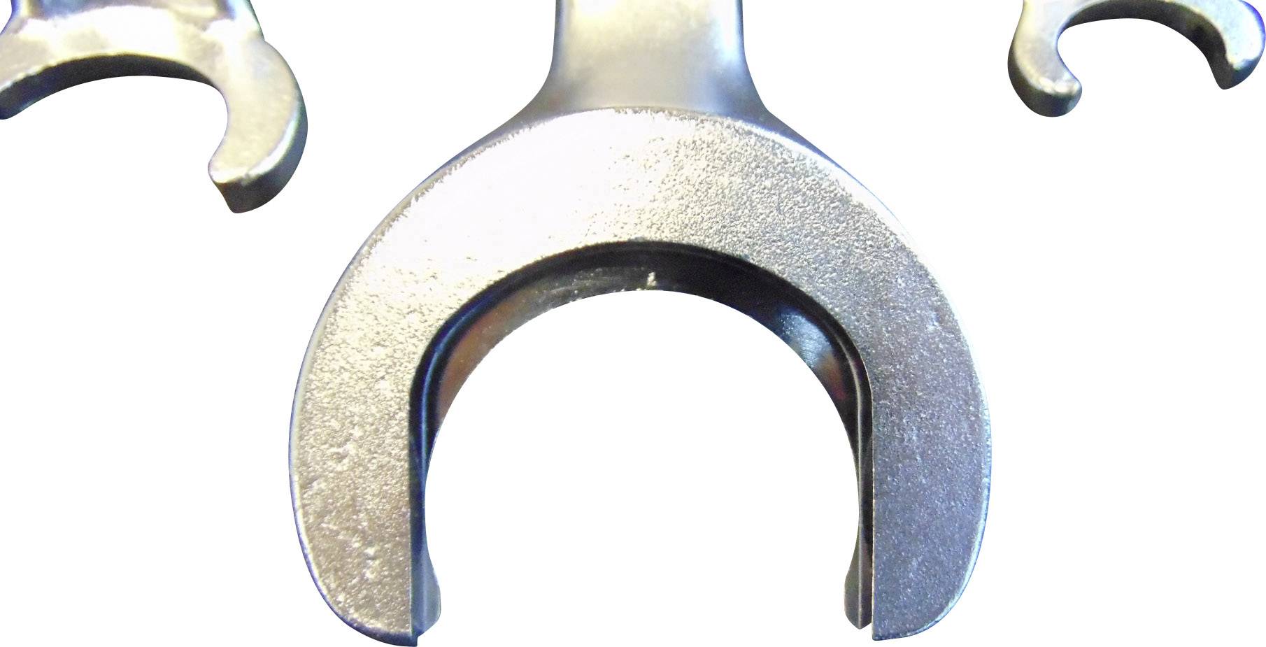 Metal key with a semicircular opening in the centre, surrounded by similar tools. Ideal for screws with a special shape.