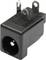 Black DC socket with three metal contacts, suitable for connecting power supplies to electronic devices.
