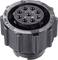 A round black electrical connector with multiple circular pins and markings on the external surface.