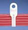 A red cable bundle is held by a white plastic cable clip with a round opening at the top. Background blue.