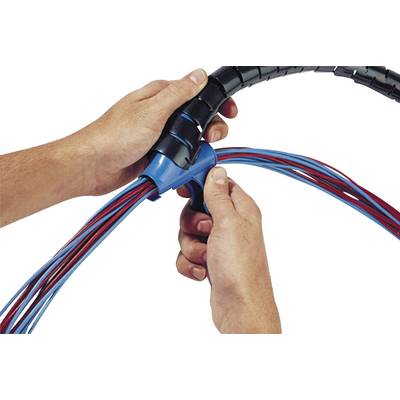 'Two hands are arranging red and blue wires in a black cable sheath.'
