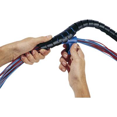 Hands secure cables with a black cable spiral sleeve to organise and protect the cables.