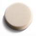 A round, cream-coloured tablet with a smooth surface, on a white background.
