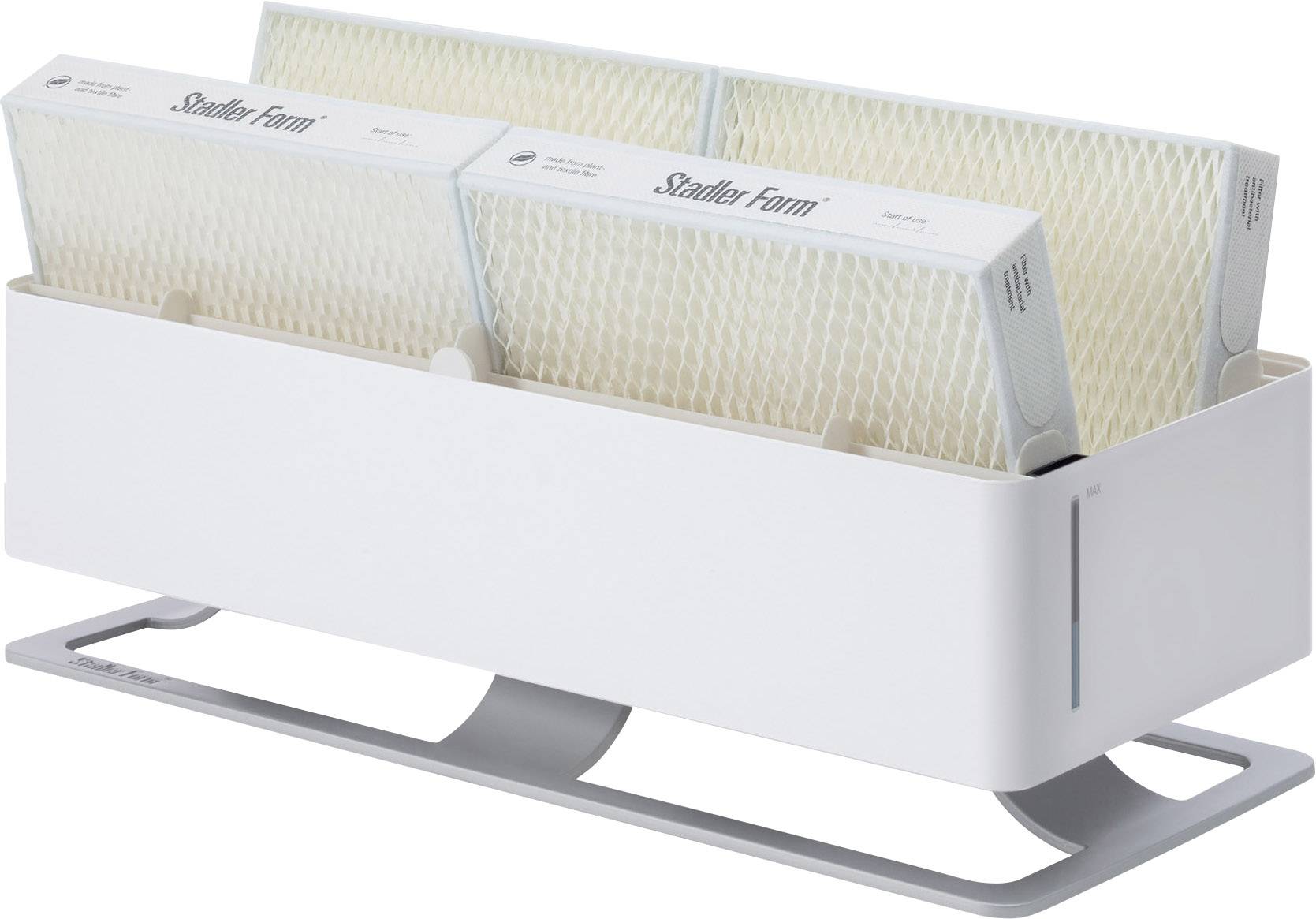 A rectangular humidifier with multiple interchangeable filters, sitting on a table.