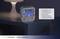 Digital alarm clock with illuminated display showing 5:59. It features functions for two alarm times, days of the week, and automatic lighting.