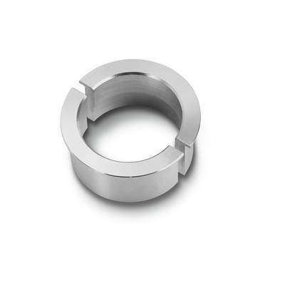 A silver, metallic ring with an opening on a white surface.
