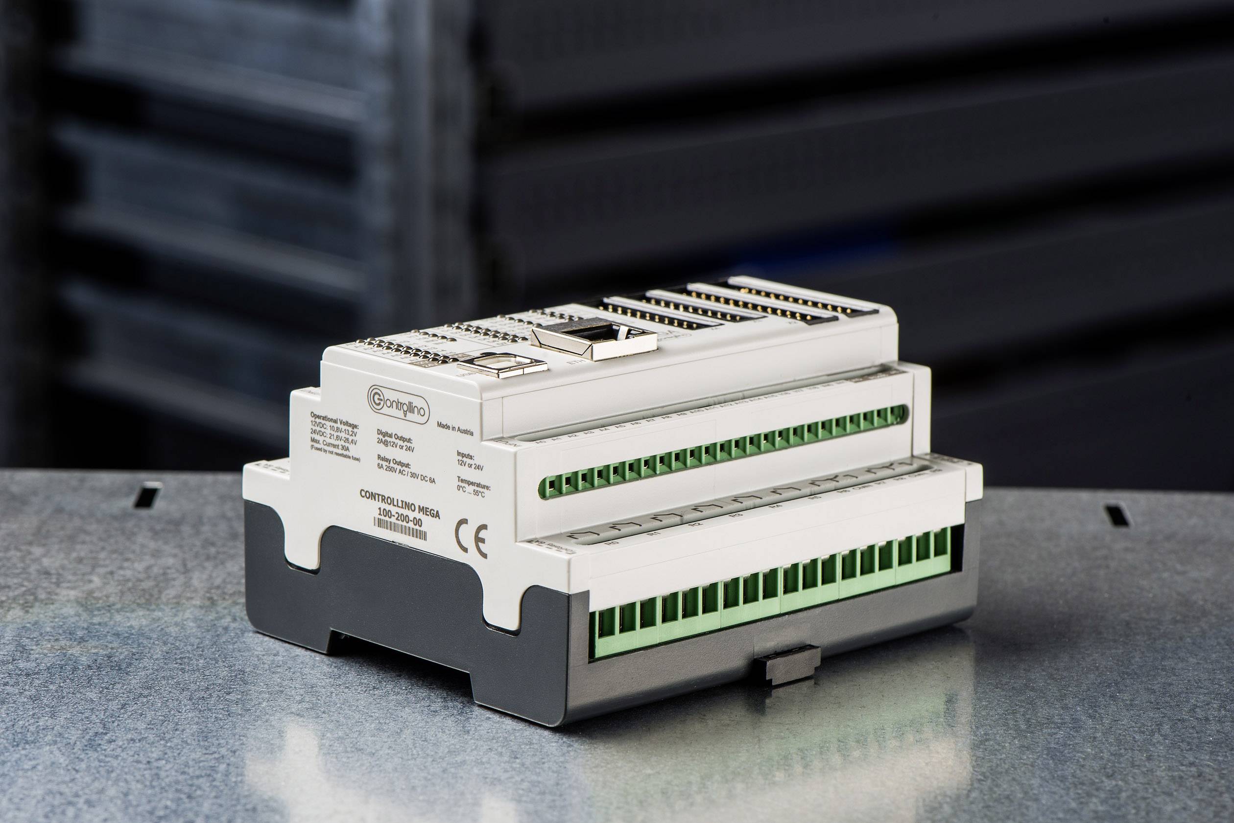 Industrial equipment on a metallic surface. It has multiple ports and connections and is suitable for control applications.