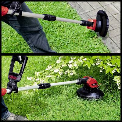 A person is using a strimmer to cut grass and plants along a paved pathway. A simple gardening scene.