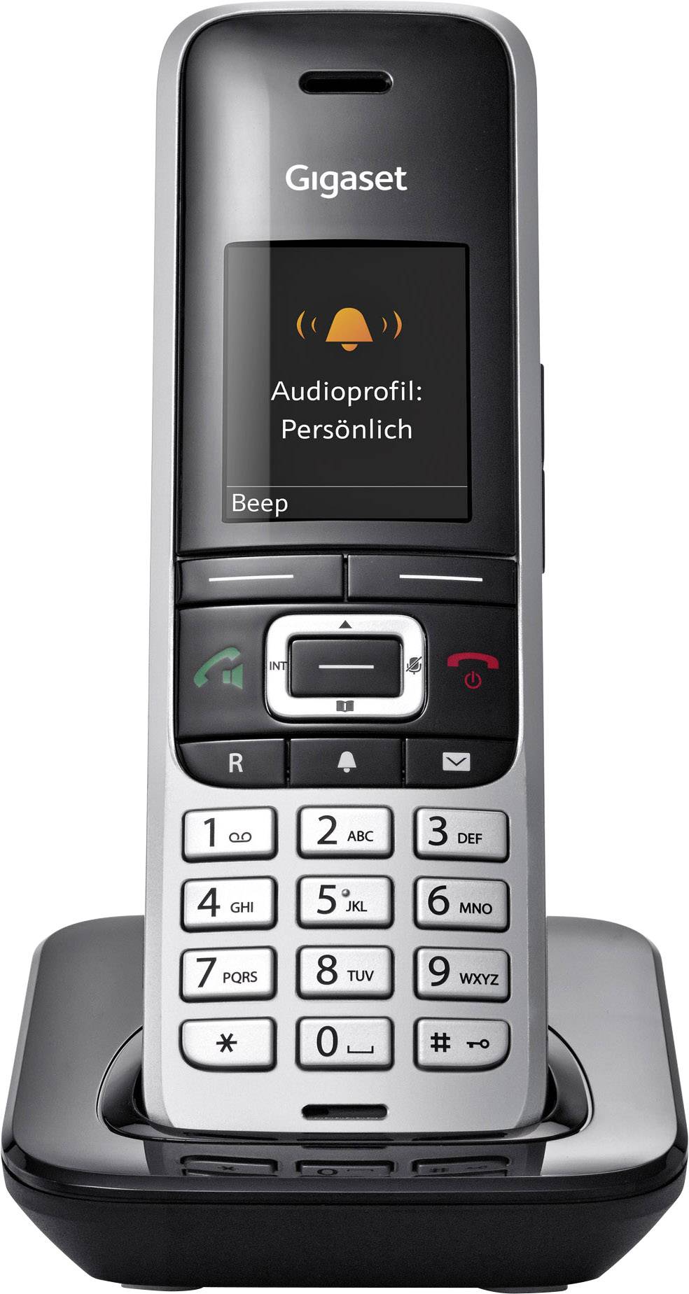 Cordless landline telephone in a charging station. Display shows 'Audio profile: Personal'. Standard button layout visible.