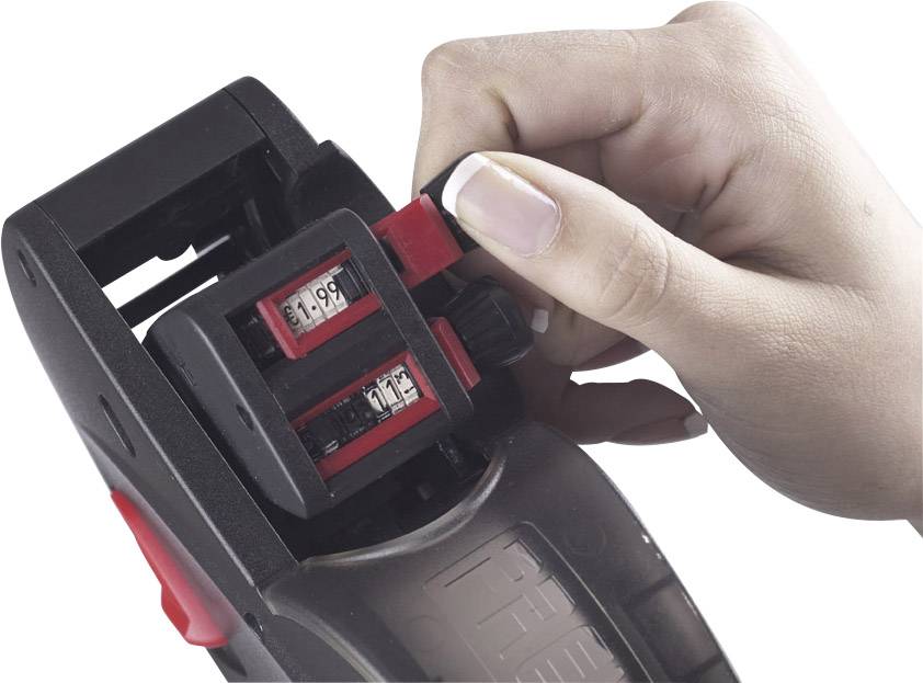 A hand adjusts a labelling device displaying prices.