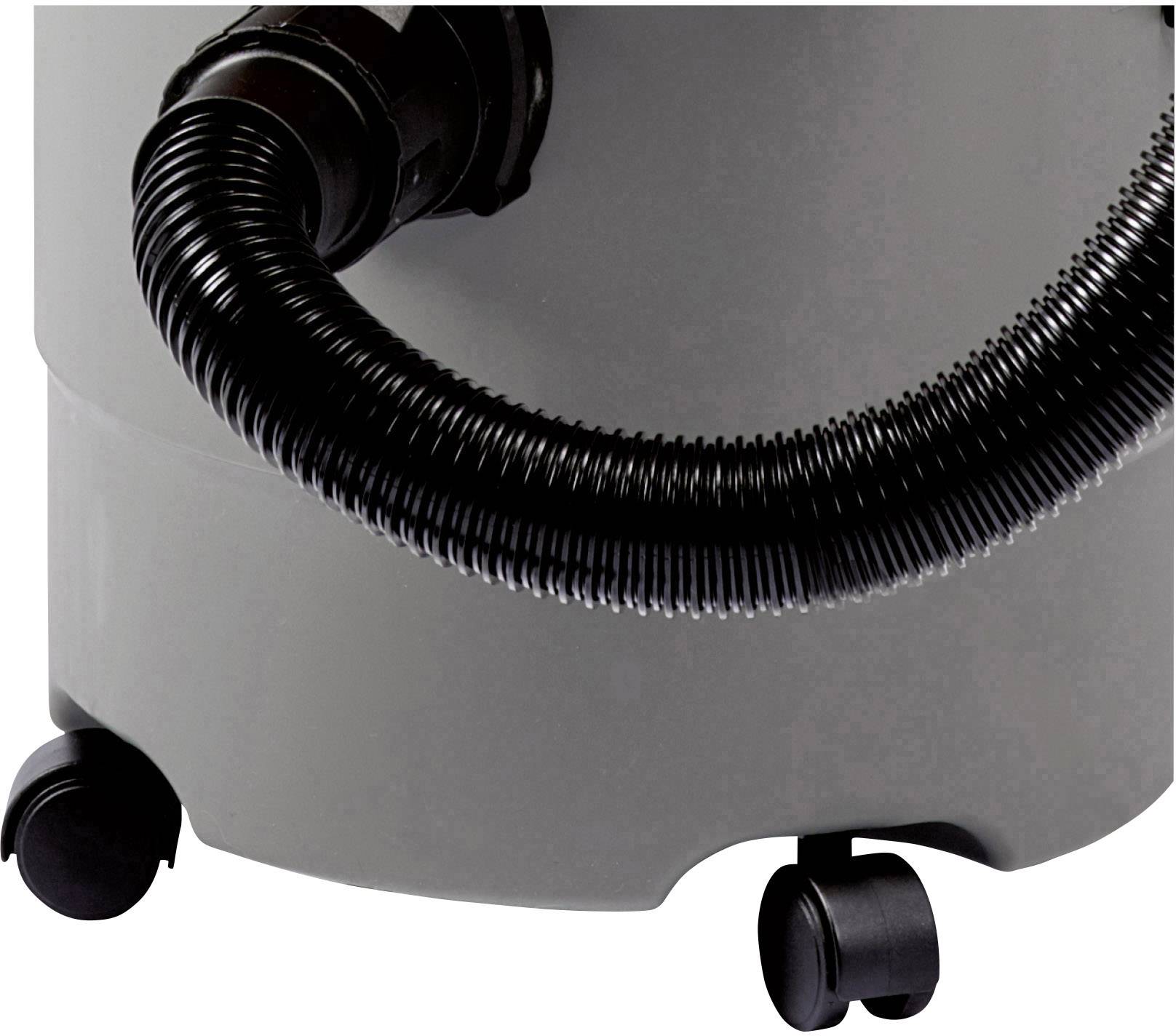 A grey vacuum cleaner with a black hose and wheels, shown in a close-up of the lower part of the appliance.