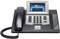 Telephone with digital display, showing time '08:01', date and name 'Hans Mehl', keypad and call control buttons.
