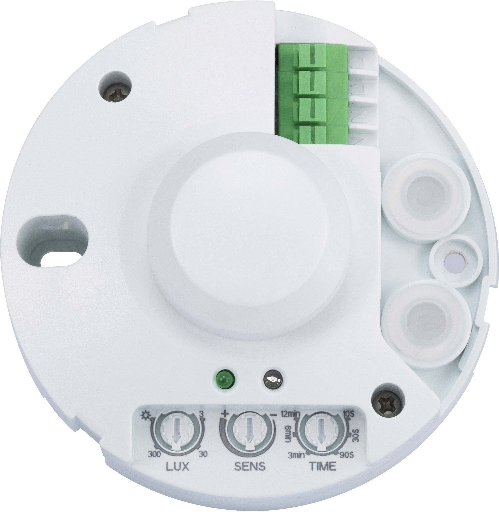 A round motion sensor in white with LUX, SENS, and TIME controls. Green terminal blocks are visible at the top.