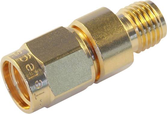 A golden metal adapter with threading for connections. Used in technical or electronic applications for cable connections.