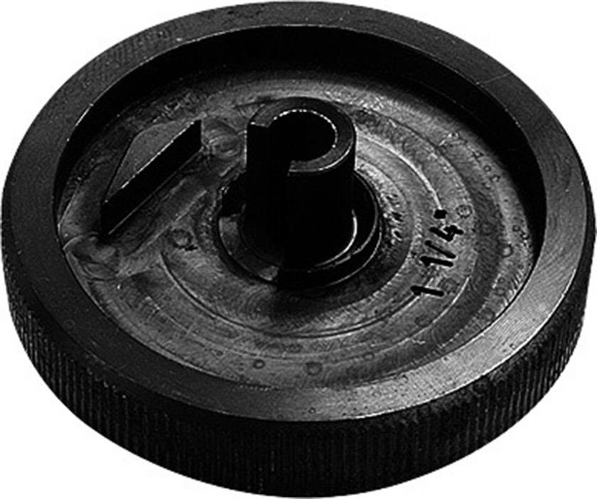 A round, black gear wheel with a central pivot and a side slot. The surface is grooved with the marking '1/4'.